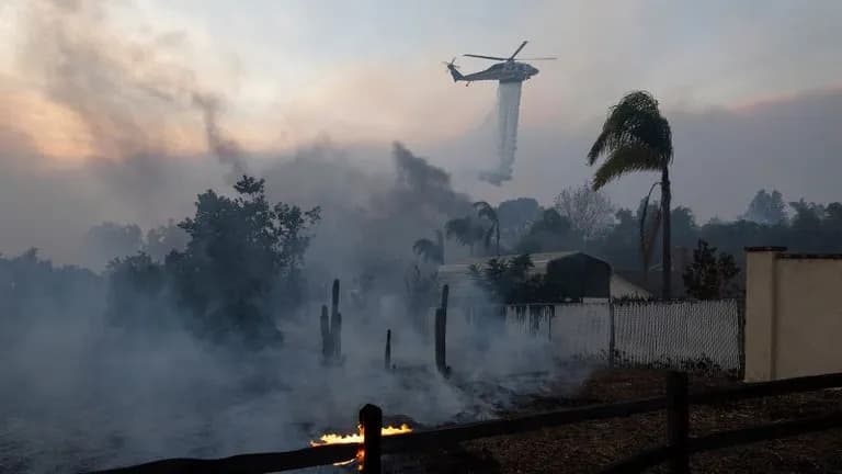 ‘We barely made it out’: Californians desperately flee their homes amid raging wildfires-0