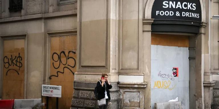  tobacco shop tobacconist shop tobacconist bookshop bookstore bookstall street sign pay-phone pay-station-0