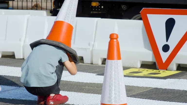  street sign trailer truck tractor trailer trucking rig rig articulated lorry semi traffic light traffic signal stoplight manhole cover-0