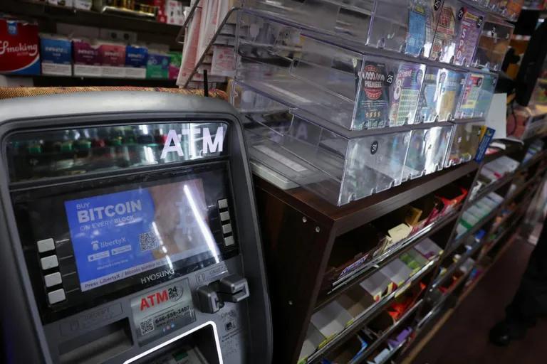  cash machine cash dispenser automated teller machine automatic teller machine automated teller automatic teller ATM tobacco shop tobacconist shop tobacconist vending machine gas pump gasoline pump petrol pump island dispenser-0