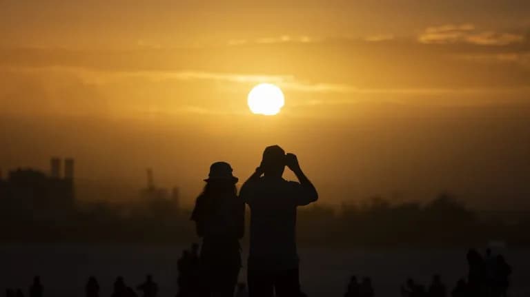  binoculars field glasses opera glasses seashore coast seacoast sea-coast balloon cliff drop drop-off-0