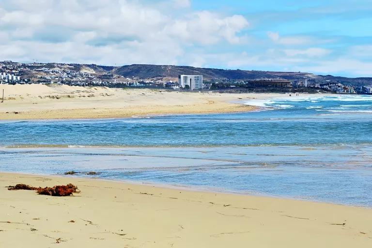  seashore coast seacoast sea-coast sandbar sand bar promontory headland head foreland cliff drop drop-off-0