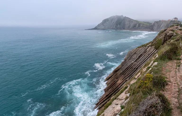  promontory headland head foreland cliff drop drop-off seashore coast seacoast sea-coast sandbar sand bar-0